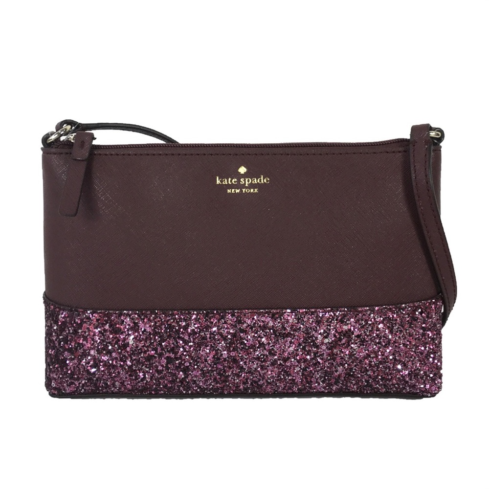 Kate Spade Greta Crossbody purse in Cherrywood and mixed pink glitter on bottom.